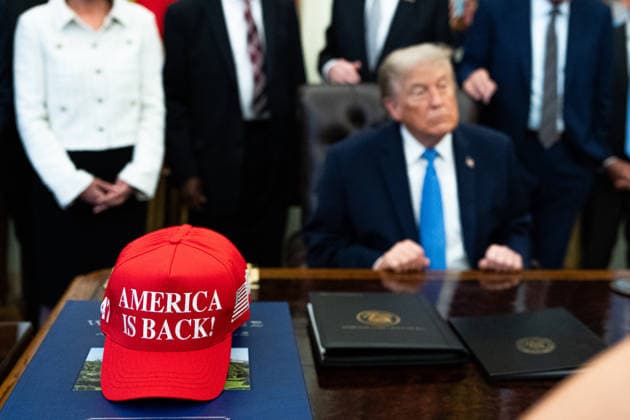 President Trump Speaks On White House Religious Liberty Commission Report ‘America is Back’ hats in the Oval Office of the White House in Washington, DC, US, on Friday, June 26, 2026. Trump is speaking on the report released by the White House Religious Liberty Commission, which was established by executive order last year. Credit: Aaron Schwartz CNP Washington District of Columbia United States  Copyright: xPool ABACAx
