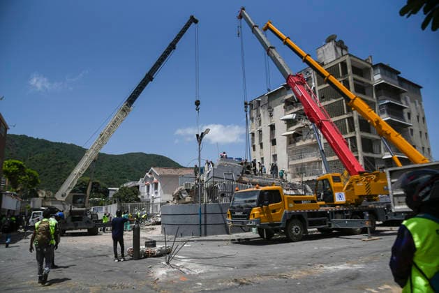 Aftermath Of Earthquakes In Caracas Emergency services work at the site of a collapsed building following earthquakes in Caracas, Venezuela, on June 26, 2026. Caracas Venezuela  Copyright: xJonathanxLanzax originalFilename: lanza-notitle260626_np3qS.jpg