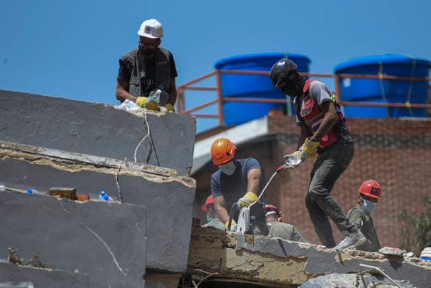 Aftermath Of Earthquakes In Caracas Emergency services work at the site of a collapsed building following earthquakes in Caracas, Venezuela, on June 26, 2026. Caracas Venezuela  Copyright: xJonathanxLanzax originalFilename: lanza-notitle260626_nph2t.jpg