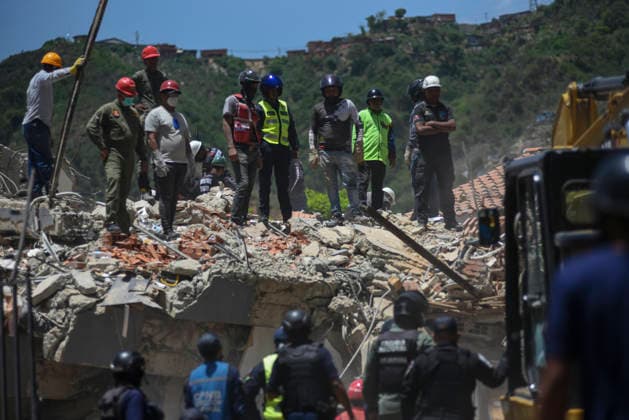 Aftermath Of Earthquakes In Caracas Emergency services work at the site of a collapsed building following earthquakes in Caracas, Venezuela, on June 26, 2026. Caracas Venezuela  Copyright: xJonathanxLanzax originalFilename: lanza-notitle260626_nprQ7.jpg
