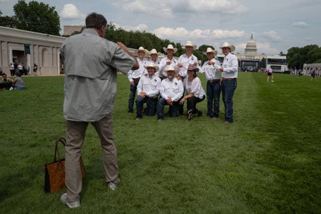 June 26, 2026, Washington, District Of Columbia, USA: Cowboys and cowgirls pose for a photograph before a rodeo during the Great American State Fair on the National Mall in Washington, D.C. on June 26, 2026. Rodeo 250, produced by Cervi Rodeo Company, is one of numerous events during the 16-day fair, celebrating the 250th anniversary of the United States of America. Washington USA - ZUMAd227 20260626_znp_d227_002 Copyright: xBryanxDozierx