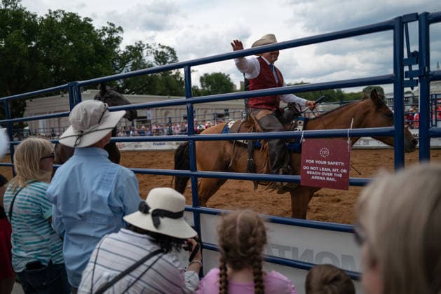 June 26, 2026, Washington, District Of Columbia, USA: A cowboy waves to a crowd at a rodeo during the Great American State Fair on the National Mall in Washington, D.C. on June 26, 2026. Rodeo 250, produced by Cervi Rodeo Company, is one of numerous events during the 16-day fair, celebrating the 250th anniversary of the United States of America. Washington USA - ZUMAd227 20260626_znp_d227_016 Copyright: xBryanxDozierx