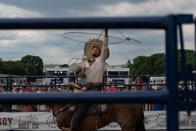 June 26, 2026, Washington, District Of Columbia, USA: A cowboy throws a lasso at a rodeo during the Great American State Fair on the National Mall in Washington, D.C. on June 26, 2026. Rodeo 250, produced by Cervi Rodeo Company, is one of numerous events during the 16-day fair, celebrating the 250th anniversary of the United States of America. Washington USA - ZUMAd227 20260626_znp_d227_019 Copyright: xBryanxDozierx