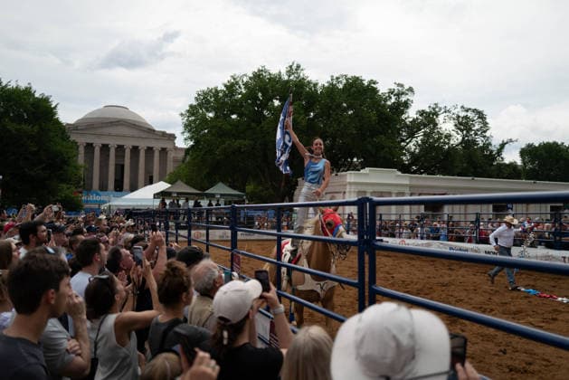 June 26, 2026, Washington, District Of Columbia, USA: A woman rides a horse at a rodeo during the Great American State Fair on the National Mall in Washington, D.C. on June 26, 2026. Rodeo 250, produced by Cervi Rodeo Company, is one of numerous events during the 16-day fair, celebrating the 250th anniversary of the United States of America. Washington USA - ZUMAd227 20260626_znp_d227_024 Copyright: xBryanxDozierx