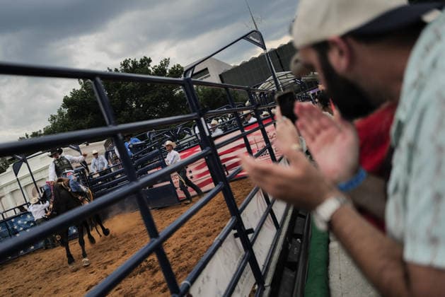 June 26, 2026, Washington, District Of Columbia, USA: People applaud as a cowboy rides a horse at a rodeo during the Great American State Fair on the National Mall in Washington, D.C. on June 26, 2026. Rodeo 250, produced by Cervi Rodeo Company, is one of numerous events during the 16-day fair, celebrating the 250th anniversary of the United States of America. Washington USA - ZUMAd227 20260626_znp_d227_034 Copyright: xBryanxDozierx