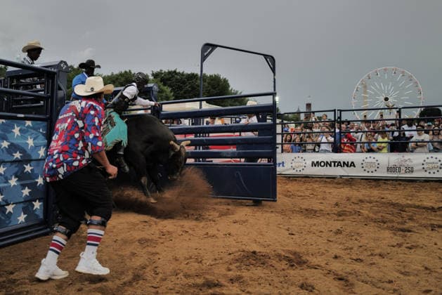 June 26, 2026, Washington, District Of Columbia, USA: Crowds watch a bull rider ride a bucking bull at a rodeo during the Great American State Fair on the National Mall in Washington, D.C. on June 26, 2026. Rodeo 250, produced by Cervi Rodeo Company, is one of numerous events during the 16-day fair, celebrating the 250th anniversary of the United States of America. Washington USA - ZUMAd227 20260626_znp_d227_044 Copyright: xBryanxDozierx