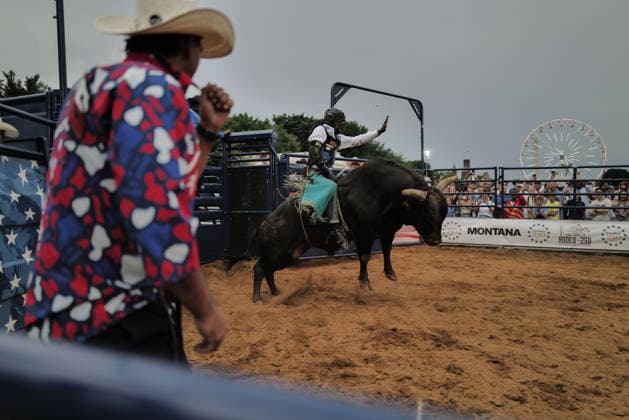 June 26, 2026, Washington, District Of Columbia, USA: Crowds watch a bull rider ride a bucking bull at a rodeo during the Great American State Fair on the National Mall in Washington, D.C. on June 26, 2026. Rodeo 250, produced by Cervi Rodeo Company, is one of numerous events during the 16-day fair, celebrating the 250th anniversary of the United States of America. Washington USA - ZUMAd227 20260626_znp_d227_048 Copyright: xBryanxDozierx