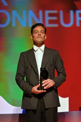 4th Nouvelles Vagues International Biarritz Film Festival Day Four FC Rami Malek speaks onstage during the premiere of In Waves on Day Four of the 4th Nouvelles Vagues International Biarritz Film Festival on June 26, 2026 in Biarritz, France. Photo by Franck Castel ABACAPRESS.COM Biarritz France  Copyright: xCastelxFranck ABACAx