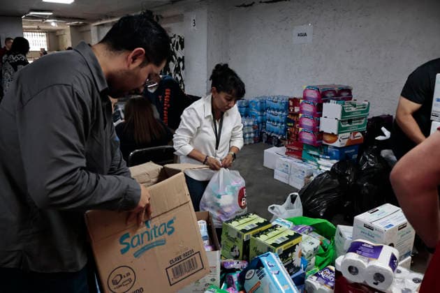 June 26, 2026, Mexico City, Cdmx, Mexico: In response to earthquakes that have caused material losses and casualties in Venezuela, the country s embassy in Mexico City opened its doors as a collection center. It is accepting humanitarian aid brought by Mexicans, foreign nationals, and Venezuelans living in Mexico to provide support during this time. On the first day of accepting itemsâ€including medicines, non-perishable food, water, and hygiene productsâ€dozens of Venezuelans working as app-based delivery drivers arrived at the embassy. Carrying flags and singing their national anthem, they brought supplies needed by their relatives and fellow citizens. Many stated that while their people endure this crisis caused by natural di - ZUMAp204 20260626_zip_p204_007 Copyright: xJosuexPerezx