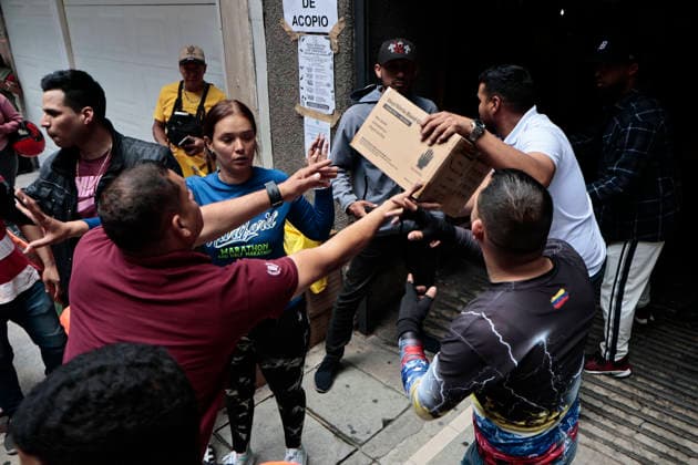 June 26, 2026, Mexico City, Cdmx, Mexico: Volunteers deliver boxes of humanitarian aid to the Venezuelan Embassy in Mexico City following deadly earthquakes in Venezuela. The embassy is collecting medicines, bottled water, nonperishable food and hygiene supplies for people affected by the disaster. Mexico City Mexico  - ZUMAp204 20260626_zip_p204_055 Copyright: xJosuexPerezx
