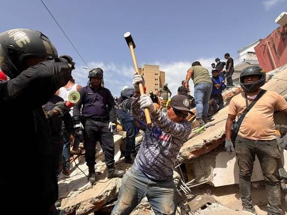 Search for people trapped under rubble continues in Venezuela s La Guaira LA GUAIRA, VENEZUELA - JUNE 26: Search and rescue operations continue at the sites of collapsed buildings in Macuto, La Guaira, Venezuela, following the earthquakes on June 26, 2026. Emergency crews continued efforts to locate and rescue people trapped beneath the rubble. Venezuela was hit with a 4.7 magnitude earthquake Friday as the nation recovers from devastating earthquakes earlier this week. The US Geological Survey (USGS) reported that an aftershock was felt 54 kilometers (34 miles) north of El Limon, at a depth of 10 kilometers, at 2216GMT, keeping traumatized survivors on edge amid rescue operations. International aid and search and rescue parties have been d  Copyright: x2026xAnadoluxJulioxUrribarrix