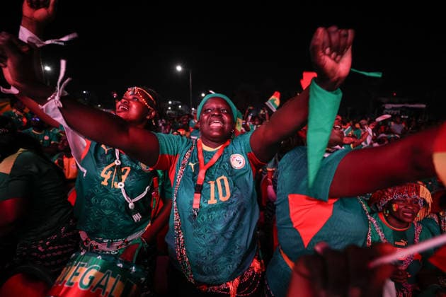 Senegal fans celebrate national team s World Cup victory in Dakar DAKAR, SENEGAL - JUNE 27: Senegalese fans celebrate their national team s 5-0 victory over Iraq in the FIFA World Cup at Place de la Nation in Dakar, Senegal, on June 27, 2026. Hundreds of supporters watch the match on giant screens set up in the square and cheer as Senegal scores each goal. Cem Ozdel Anadolu Dakar Senegal. Editorial use only. Please get in touch for any other usage.  Copyright: x2026xAnadoluxCemxOzdelx