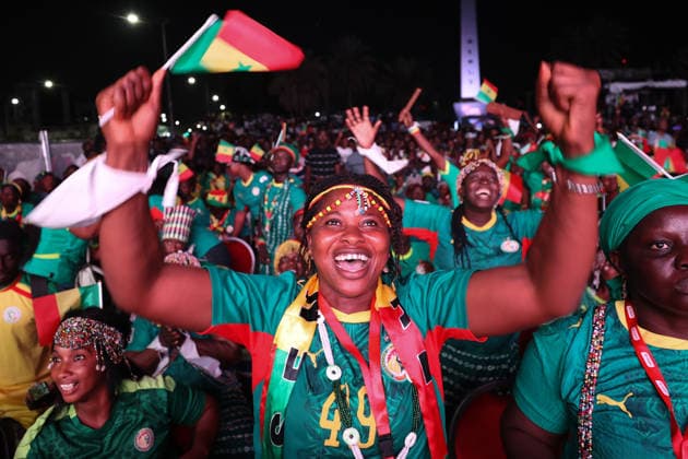 Senegal fans celebrate national team s World Cup victory in Dakar DAKAR, SENEGAL - JUNE 27: Senegalese fans celebrate their national team s 5-0 victory over Iraq in the FIFA World Cup at Place de la Nation in Dakar, Senegal, on June 27, 2026. Hundreds of supporters watch the match on giant screens set up in the square and cheer as Senegal scores each goal. Cem Ozdel Anadolu Dakar Senegal. Editorial use only. Please get in touch for any other usage.  Copyright: x2026xAnadoluxCemxOzdelx