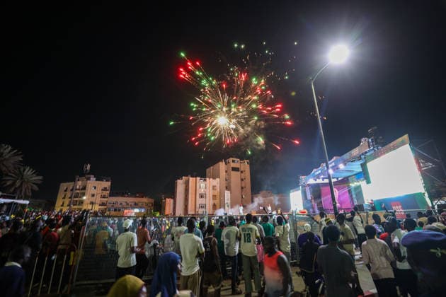 Senegal fans celebrate national team s World Cup victory in Dakar DAKAR, SENEGAL - JUNE 27: Senegalese fans celebrate their national team s 5-0 victory over Iraq in the FIFA World Cup at Place de la Nation in Dakar, Senegal, on June 27, 2026. Hundreds of supporters watch the match on giant screens set up in the square and cheer as Senegal scores each goal. Cem Ozdel Anadolu Dakar Senegal. Editorial use only. Please get in touch for any other usage.  Copyright: x2026xAnadoluxCemxOzdelx