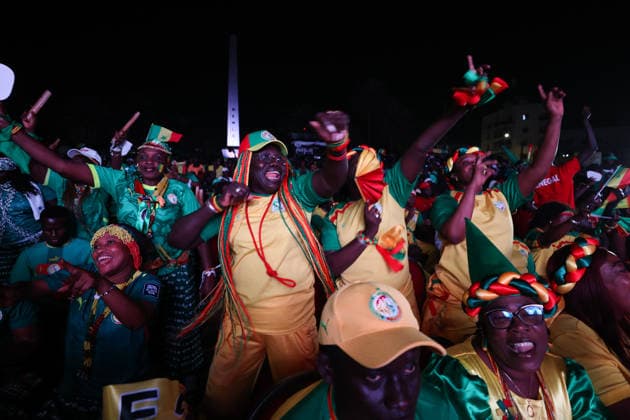 Senegal fans celebrate national team s World Cup victory in Dakar DAKAR, SENEGAL - JUNE 27: Senegalese fans celebrate their national team s 5-0 victory over Iraq in the FIFA World Cup at Place de la Nation in Dakar, Senegal, on June 27, 2026. Hundreds of supporters watch the match on giant screens set up in the square and cheer as Senegal scores each goal. Cem Ozdel Anadolu Dakar Senegal. Editorial use only. Please get in touch for any other usage.  Copyright: x2026xAnadoluxCemxOzdelx