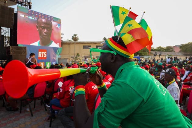Senegal fans celebrate national team s World Cup victory in Dakar DAKAR, SENEGAL - JUNE 27: A Senegalese fan watches the FIFA World Cup match between Senegal and Iraq on giant screens set up at Place de la Nation, where supporters celebrate Senegal s 5-0 victory over Iraq, in Dakar, Senegal, on June 27, 2026. Cem Ozdel Anadolu Dakar Senegal. Editorial use only. Please get in touch for any other usage.  Copyright: x2026xAnadoluxCemxOzdelx