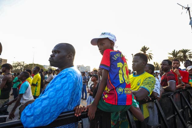 Senegal fans celebrate national team s World Cup victory in Dakar DAKAR, SENEGAL - JUNE 27: A Senegalese fan watches the FIFA World Cup match between Senegal and Iraq on giant screens set up at Place de la Nation, where supporters celebrate Senegal s 5-0 victory over Iraq, in Dakar, Senegal, on June 27, 2026. Cem Ozdel Anadolu Dakar Senegal. Editorial use only. Please get in touch for any other usage.  Copyright: x2026xAnadoluxCemxOzdelx