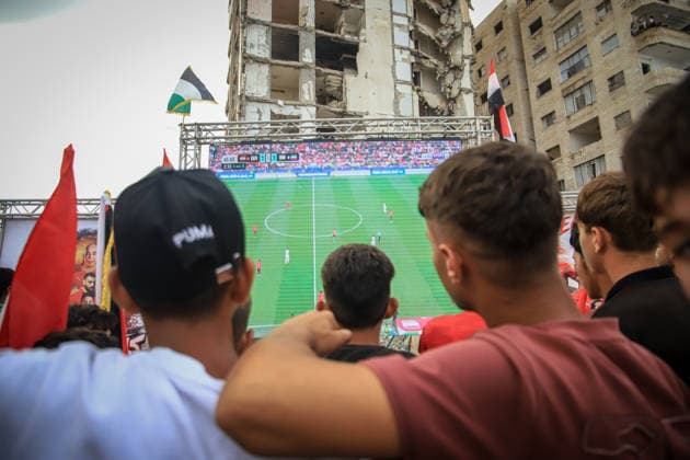 Palestinians watch the Iran-Egypt match on giant screens set up amid the rubble GAZA CITY, GAZA, PALESTINE - JUNE 27: Palestinians holding flags gather to watch the 2026 FIFA World Cup First Stage Group G match between Egypt and Iran on a giant screen set up among the rubble of destroyed buildings despite Israel s ongoing attacks in Gaza City, Gaza, Palestine, on June 27, 2026. Abdalhkem Abu Riash Anadolu Gaza City Gaza. Editorial use only. Please get in touch for any other usage.  Copyright: x2026xAnadoluxAbdalhkemxAbuxRiashx