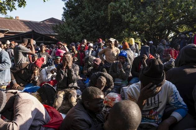 Undocumented Malawian migrants are being evacuated from South Africa KWAZULU-NATAL, SOUTH AFRICA - JUNE 26: Men are seen with their loads as thousands of Malawian migrants were put on buses to return to their home country following a rise in xenophobic attacks and anti-immigrant protests in the city of Pietermaritzburg in KwaZulu-Natal province, South Africa, on June 26, 2026. Ihsaan Haffejee Anadolu KwaZulu-Natal South Africa. Editorial use only. Please get in touch for any other usage.  Copyright: x2026xAnadoluxIhsaanxHaffejeex