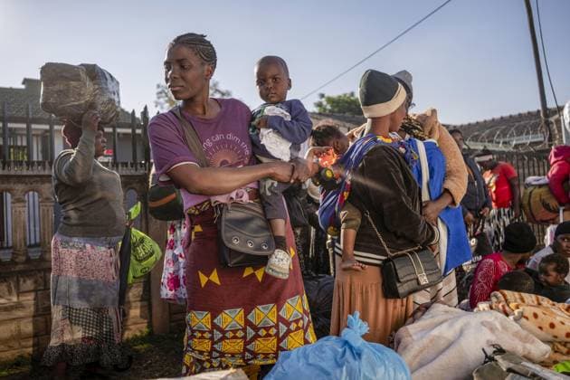 Undocumented Malawian migrants are being evacuated from South Africa KWAZULU-NATAL, SOUTH AFRICA - JUNE 26: Women are seen with their loads as thousands of Malawian migrants were put on buses to return to their home country following a rise in xenophobic attacks and anti-immigrant protests in the city of Pietermaritzburg in KwaZulu-Natal province, South Africa, on June 26, 2026. Ihsaan Haffejee Anadolu KwaZulu-Natal South Africa. Editorial use only. Please get in touch for any other usage.  Copyright: x2026xAnadoluxIhsaanxHaffejeex