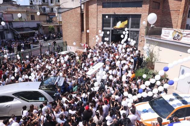 IPA86125532 - Naples: The funeral of Lorenzo Spasiano, the 19-year-old worker killed in Miano by a gunshot to the chest. A huge crowd gathered outside the church to say a final goodbye to Lorenzo  Copyright: xx xx 86125532