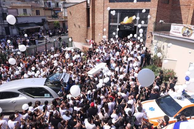 IPA86125534 - Naples: The funeral of Lorenzo Spasiano, the 19-year-old worker killed in Miano by a gunshot to the chest. A huge crowd gathered outside the church to say a final goodbye to Lorenzo  Copyright: xx xx 86125534