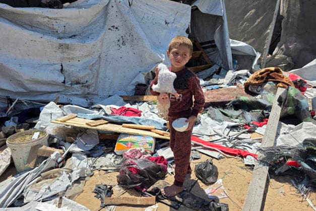 Displaced Palestinians inspect damaged tents after strike in al-Mawasi Displaced Palestinians inspect damage to their tents after an Israeli strike targeted a tent in the al-Mawasi area of Khan Younis, southern Gaza Strip, on June 27, 2026. The strike killed a young man and a child, wounded others, and caused extensive damage to displaced families tents and belongings. Photo by Tariq Mohammad APA Images Khan Yunis Gaza Strip Palestinian Territory 270626_Khan_Yunis_TM_02(20) Copyright: xapaimagesxTariqxMohammad xapaimagesx