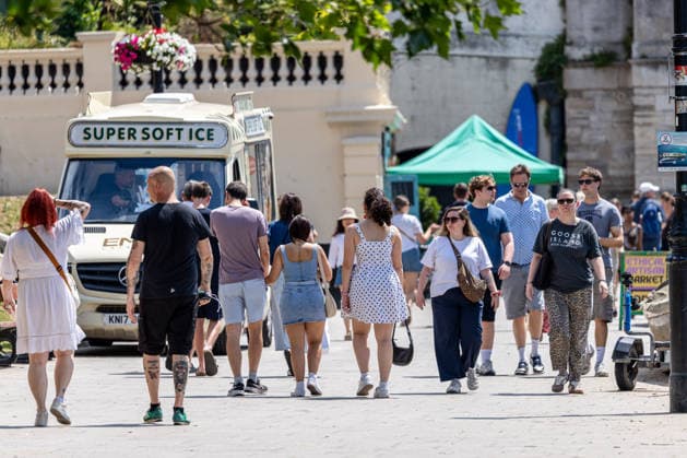 June 27, 2026, London, UK: London, UK. Walkers enjoy the sunshine on a busy Richmond Riverside south west London today as weather forecasters announce the end of the June record braking heatwave. The Met Office have issued another extreme heat weather warning for London and the South East today as temperatures are set to hit to over 31c. However, cooler weather is forecast tomorrow. London UK  - ZUMAl94_ 20260627_zaf_l94_017 Copyright: xAlexxLentatix