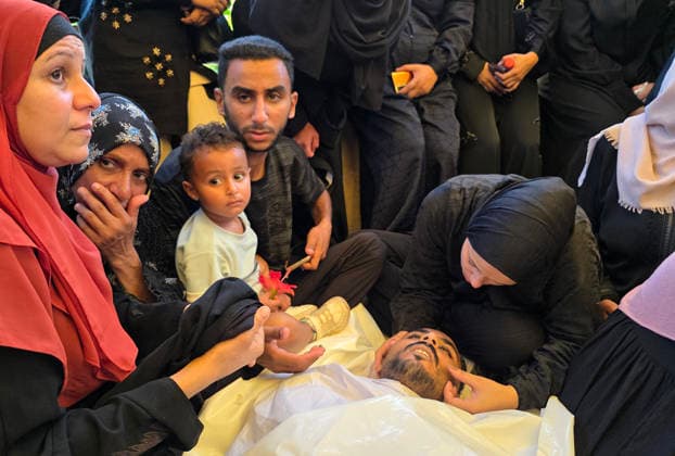 Mourners bid farewell to siblings killed in Khan Younis strike Mourners gather around the bodies of a young man and his younger sister at Nasser Medical Complex in Khan Younis, southern Gaza Strip, on June 27, 2026. The siblings were killed in an Israeli strike that targeted their tent in the al-Mawasi area of Khan Younis. Photo by Tariq Mohammad APA Images Khan Yunis Gaza Strip Palestinian Territory 270626_Khan_Yunis_TM_04(23) Copyright: xapaimagesxTariqxMohammad xapaimagesx