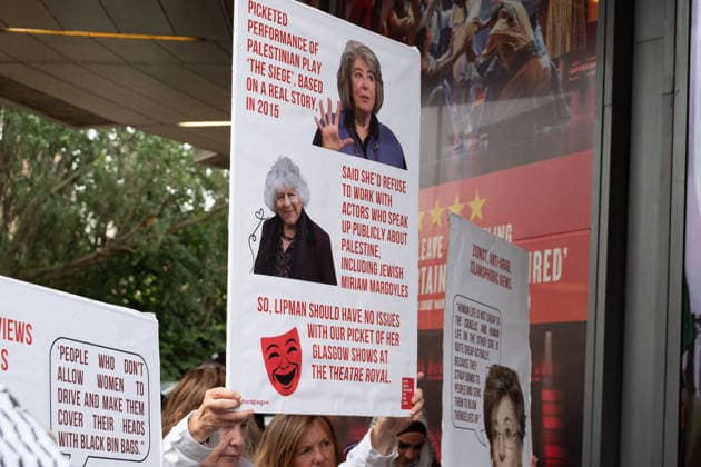June 27, 2026, Glasgow, Scotland, UK: Pro-Palestine campaigners from the group Show Israeli Genocide The Red Card have staged protests outside Glasgows Theatre Royal during performances of Dame Maureen Lipmans play Allegra. The production has drawn criticism from protesters, while the actress has rejected the allegations made against her and criticised the demonstrations. Glasgow UK - ZUMAs357 20260627_zip_s357_004 Copyright: xCameronxScottx