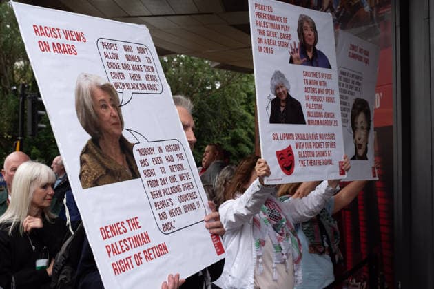 June 27, 2026, Glasgow, Scotland, UK: Pro-Palestine campaigners from the group Show Israeli Genocide The Red Card have staged protests outside Glasgows Theatre Royal during performances of Dame Maureen Lipmans play Allegra. The production has drawn criticism from protesters, while the actress has rejected the allegations made against her and criticised the demonstrations. Glasgow UK - ZUMAs357 20260627_zip_s357_008 Copyright: xCameronxScottx