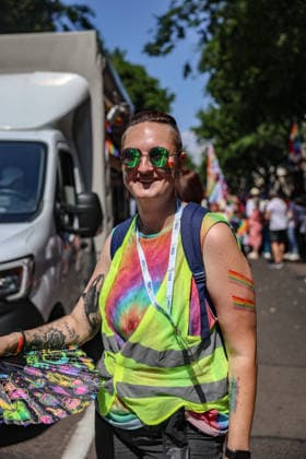 June 27, 2026, Budapest, Hungary, European Union: A woman in rainbow tie dye and reflective sunglasses holding a multicolored fan during Budapest Pride, the first Pride march held since HungaryÃ¢â‚¬â ¢s April 2026 parliamentary election. The annual event brought together LGBTQ+ people, allies and supporters calling for equality, visibility and acceptance. Budapest European Union  - ZUMAo116 20260627_znp_o116_059 Copyright: xBiancaxOterox
