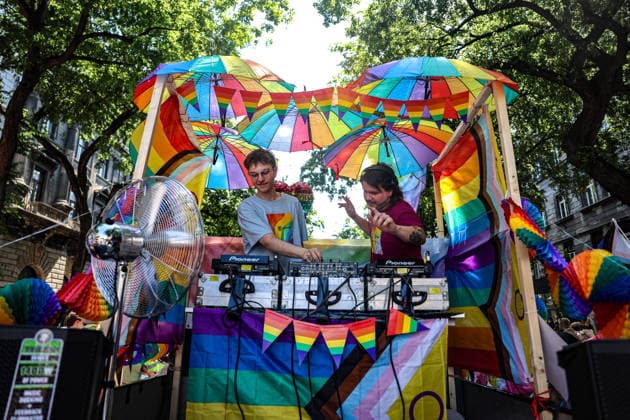 June 27, 2026, Budapest, Hungary, European Union: DJs play music under a canopy of rainbow umbrellas on a parade float during Budapest Pride, the first Pride march held since HungaryÃ¢â‚¬â ¢s April 2026 parliamentary election. The annual event brought together LGBTQ+ people, allies and supporters calling for equality, visibility and acceptance. Budapest European Union  - ZUMAo116 20260627_znp_o116_062 Copyright: xBiancaxOterox