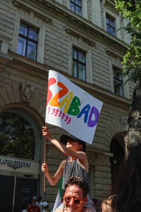June 27, 2026, Budapest, Hungary, European Union: A young girl sitting on her fatherÃ¢â‚¬â ¢s shoulders waves a sign that says FREE in Hungarian during Budapest Pride, the first Pride march held since HungaryÃ¢â‚¬â ¢s April 2026 parliamentary election. The annual event brought together LGBTQ+ people, allies and supporters calling for equality, visibility and acceptance. Budapest European Union  - ZUMAo116 20260627_znp_o116_065 Copyright: xBiancaxOterox