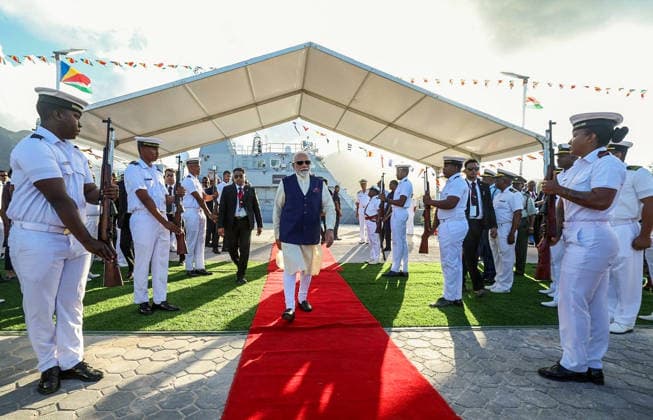 RECORD DATE NOT STATED PM Modi receives a warm welcome as he arrives at vessel handover ceremony in Seychelles Victoria Seychelles , Jun 27 (ANI): Prime Minister Narendra Modi receives a warm welcome as he arrives during the Fast Patrol Vessel handing-over ceremony at the Seychelles Coast Guard Base, in Victoria on Saturday. (@MEAIndia X ANI Photo) Victoria Seychelles Copyright: xANIx ANI_20260627445