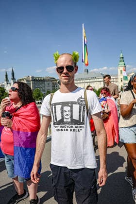 June 27, 2026, Budapest, Hungary, European Union: A participant with green hair shaved at the centre, sunglasses and a T-shirt reading Itt vagyok, ahol lennem kell, Hungarian for I am where I need to be, walks with other marchers during Budapest Pride. Budapest European Union  - ZUMAo116 20260627_znp_o116_082 Copyright: xBiancaxOterox