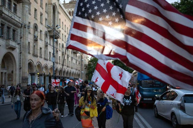 June 27, 2026, Tbilisi, Georgia: Protesters holding Georgian and U.S. flags participate on the 577th day of anti-government rallies in Tbilisi, Georgia. Tbilisi Georgia  - ZUMAz174 20260627_zip_z174_001 Copyright: xMoexZoyarix