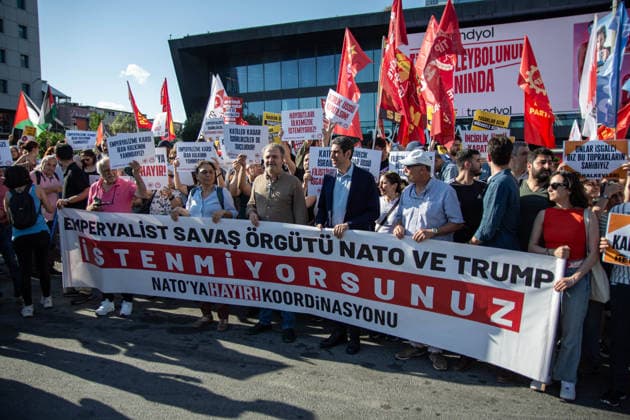 June 27, 2026, Istanbul, Istanbul, Turkey: Activists from the No to NATO! Coordination staged a protest in front of Trump Towers in Istanbul, Turkey, carrying a banner reading Imperialist war organization NATO and Trump, you are not welcome! The demonstration opposed the upcoming NATO Summit scheduled to take place in Ankara on July 7Ã¢â‚¬8. Istanbul Turkey - ZUMAt171 20260627_zip_t171_022 Copyright: xAbdullahxTepelix