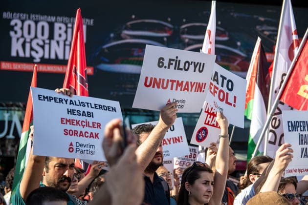 June 27, 2026, Istanbul, Istanbul, Turkey: Activists from the No to NATO! Coordination staged a protest in front of Trump Towers in Istanbul, Turkey, carrying a banner reading Imperialist war organization NATO and Trump, you are not welcome! The demonstration opposed the upcoming NATO Summit scheduled to take place in Ankara on July 7Ã¢â‚¬8. Istanbul Turkey - ZUMAt171 20260627_zip_t171_024 Copyright: xAbdullahxTepelix