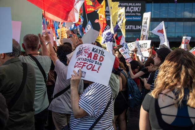 June 27, 2026, Istanbul, Istanbul, Turkey: Activists from the No to NATO! Coordination staged a protest in front of Trump Towers in Istanbul, Turkey, carrying a banner reading Imperialist war organization NATO and Trump, you are not welcome! The demonstration opposed the upcoming NATO Summit scheduled to take place in Ankara on July 7Ã¢â‚¬8. Istanbul Turkey - ZUMAt171 20260627_zip_t171_031 Copyright: xAbdullahxTepelix