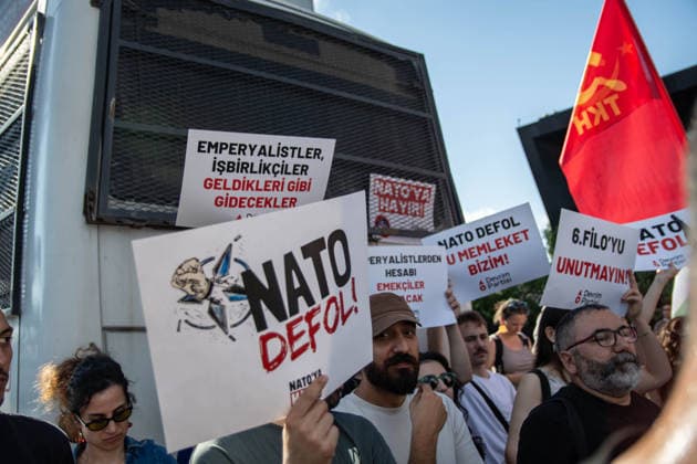 June 27, 2026, Istanbul, Istanbul, Turkey: Activists from the No to NATO! Coordination staged a protest in front of Trump Towers in Istanbul, Turkey, carrying a banner reading Imperialist war organization NATO and Trump, you are not welcome! The demonstration opposed the upcoming NATO Summit scheduled to take place in Ankara on July 7Ã¢â‚¬8. Istanbul Turkey - ZUMAt171 20260627_zip_t171_034 Copyright: xAbdullahxTepelix
