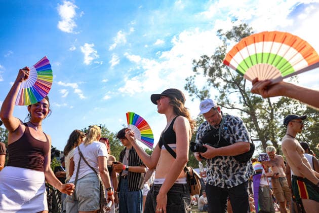 June 27, 2026, Budapest, Hungary, European Union: Participants hold rainbow hand fans and dance as they gather near the stage at the end of the Budapest Pride parade route, the first Pride march held since HungaryÃ¢â‚¬â ¢s April 2026 parliamentary election. The annual event brought together LGBTQ+ people, allies and supporters calling for equality, visibility and acceptance. Budapest European Union - ZUMAo116 20260627_znp_o116_098 Copyright: xBiancaxOterox