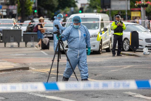 June 27, 2026, London, London, UK: London, UK. A police forensic officer gathers evidence as emergency services are at the scene in Ealing Broadway, west London, after a car struck pedestrians outside Marks & Spencer. London UK  - ZUMAl94_ 20260627_zaf_l94_032 Copyright: xMarcinxNowakx
