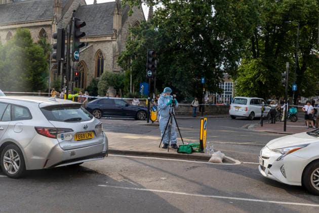 June 27, 2026, London, London, UK: London, UK. A police forensic officer gathers evidence as emergency services are at the scene in Ealing Broadway, west London, after a car struck pedestrians outside Marks & Spencer. London UK  - ZUMAl94_ 20260627_zaf_l94_035 Copyright: xMarcinxNowakx