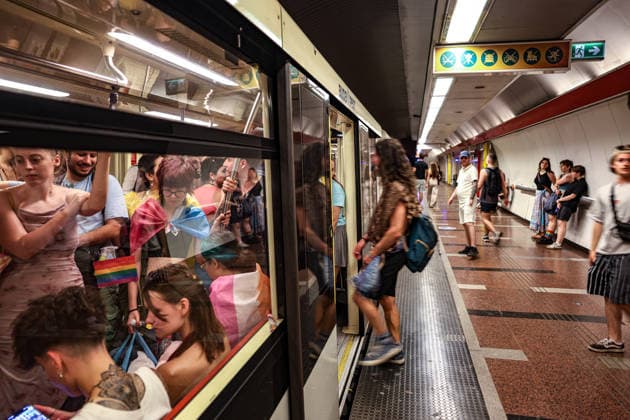 June 27, 2026, Budapest, Hungary, European Union: Passengers carrying Pride flags are seen through the window of a packed metro train as more people board after the Budapest Pride parade. Budapest European Union - ZUMAo116 20260627_znp_o116_100 Copyright: xBiancaxOterox