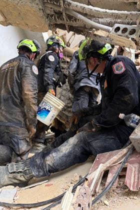 Members of USA-01, the Urban Search and Rescue Team from Fairfax County, VA, on the ground in Venezuela on Saturday, June 27, 2026, conducting search and rescue operations around the clock across multiple structures to reach any potential survivors. USA-01 arrived with 79 personnel, six K9s, and 70k lbs of equipment, to assist Venezuelan authorities with search and rescue operations following the recent earthquakes. Photo via VA-TF1 USA-01  WAX2026062701 VA-TF1 USA-01
