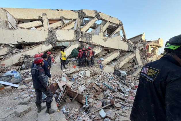 Members of USA-01, the Urban Search and Rescue Team from Fairfax County, VA, on the ground in Venezuela on Saturday, June 27, 2026, conducting search and rescue operations around the clock across multiple structures to reach any potential survivors. USA-01 arrived with 79 personnel, six K9s, and 70k lbs of equipment, to assist Venezuelan authorities with search and rescue operations following the recent earthquakes. Photo via VA-TF1 USA-01  WAX2026062704 VA-TF1 USA-01