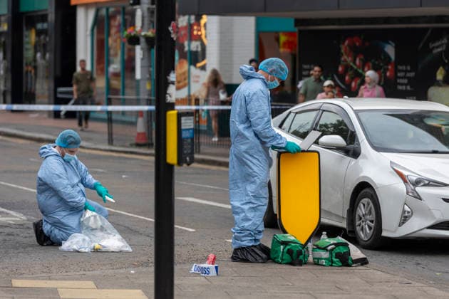 June 27, 2026, London, London, UK: London, UK. Police forensic officers gather evidence at the scene in Ealing Broadway, west London, after a car struck pedestrians outside Marks & Spencer. London UK  - ZUMAl94_ 20260627_zaf_l94_039 Copyright: xMarcinxNowakx