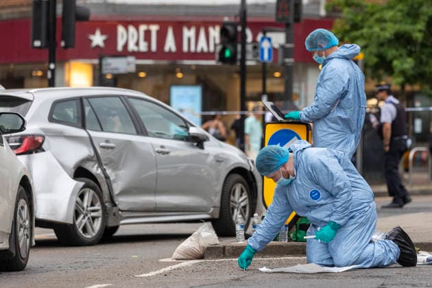 June 27, 2026, London, London, UK: London, UK. Police forensic officers gather evidence at the scene in Ealing Broadway, west London, after a car struck pedestrians outside Marks & Spencer. London UK  - ZUMAl94_ 20260627_zaf_l94_043 Copyright: xMarcinxNowakx