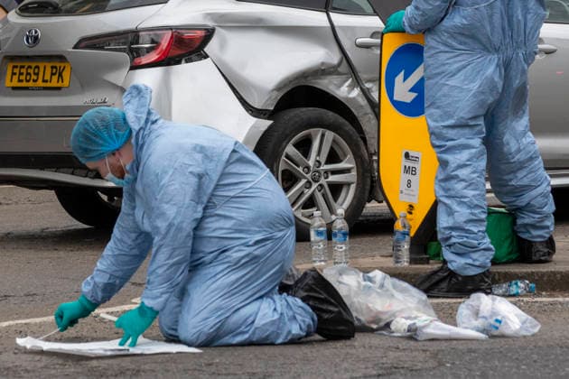 June 27, 2026, London, London, UK: London, UK. Police forensic officers gather evidence at the scene in Ealing Broadway, west London, after a car struck pedestrians outside Marks & Spencer. London UK  - ZUMAl94_ 20260627_zaf_l94_044 Copyright: xMarcinxNowakx